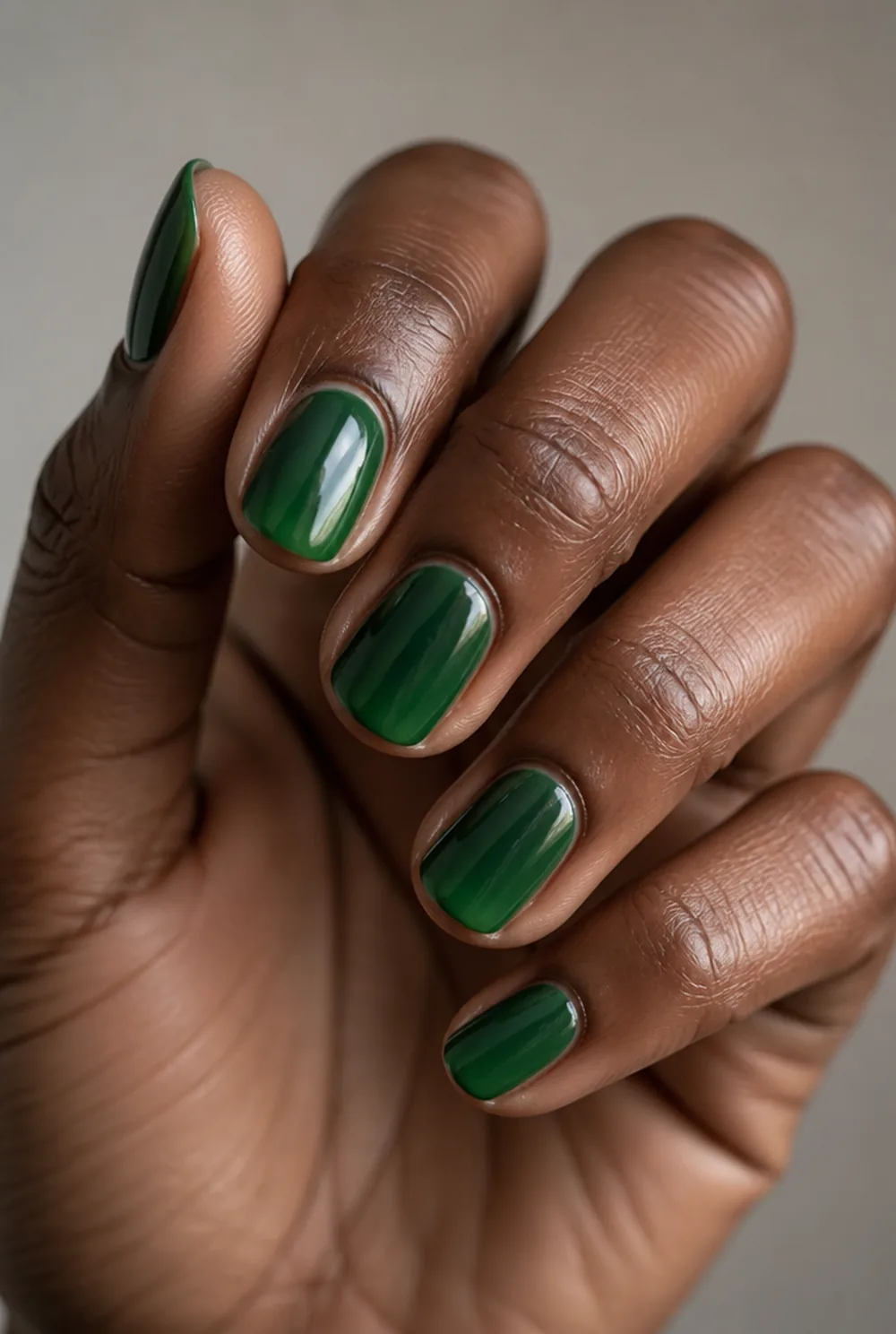 jelly green nail art on deep brown skin