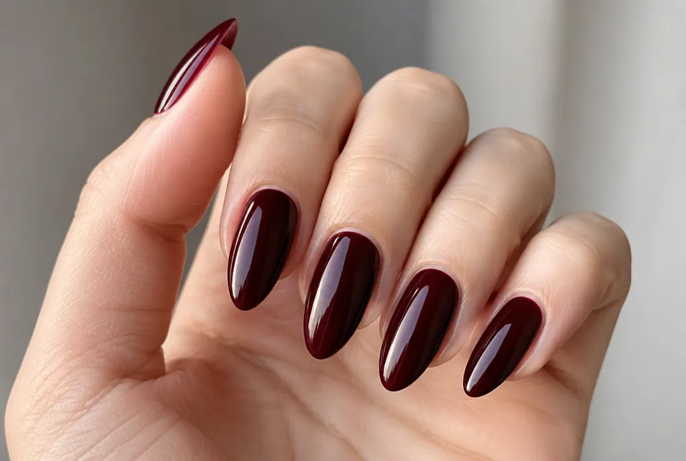 merlot wine red Christmas nails on long almond nails