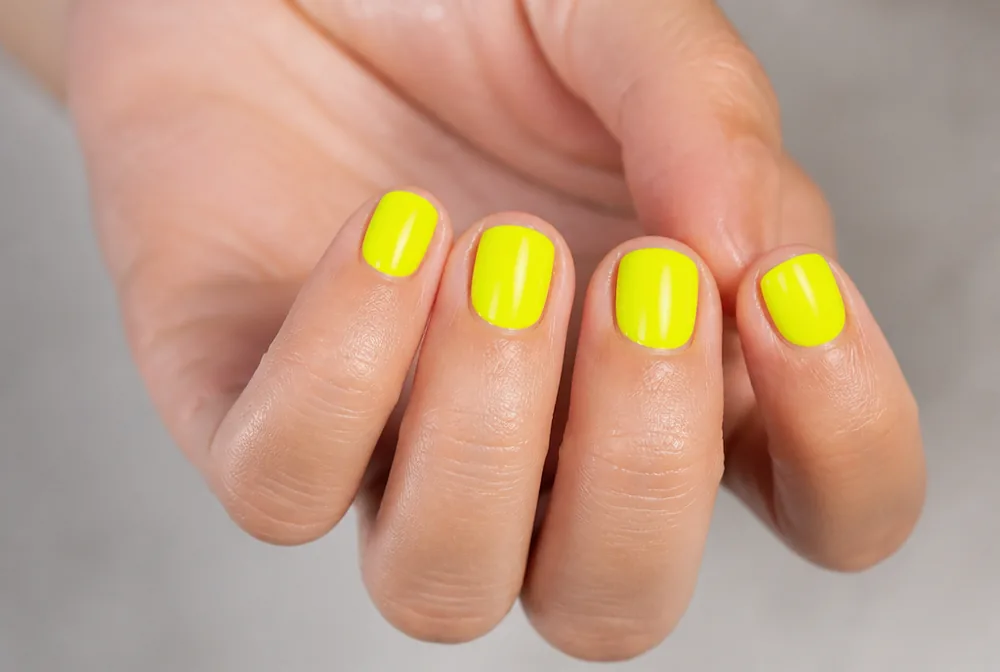 neon yellow nails on very short square
