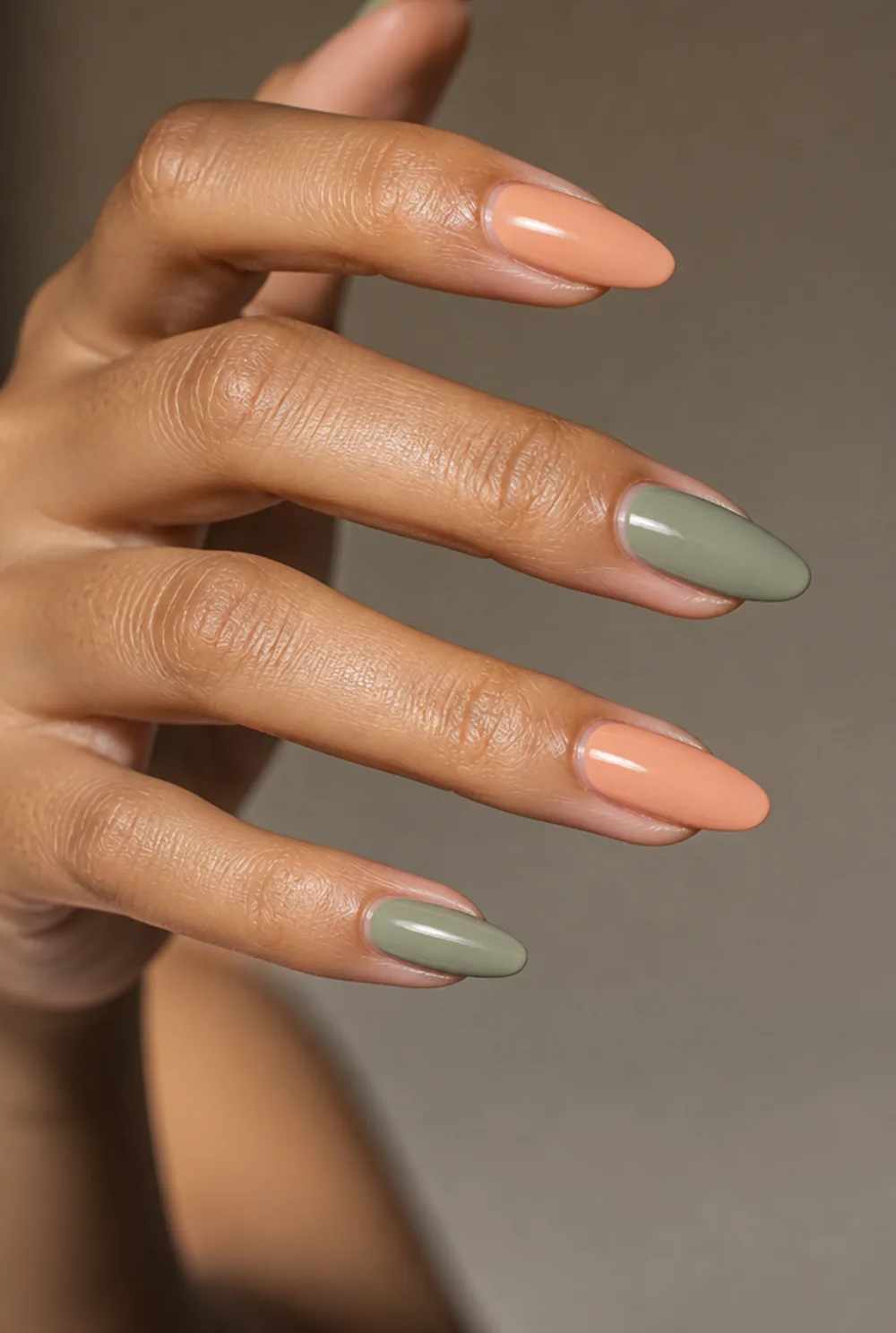 peach and sage nail art on olive skin, long length
