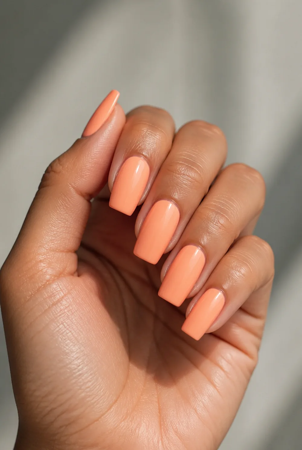 apricot nail art on olive skin, long length