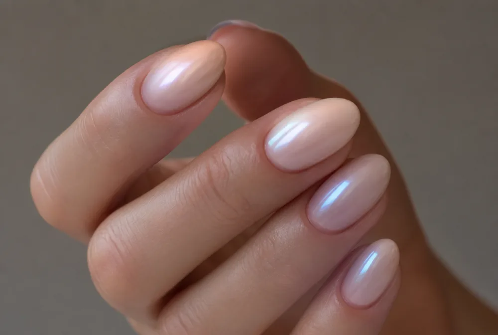 pink glazed donut nails with pearl chrome overlay