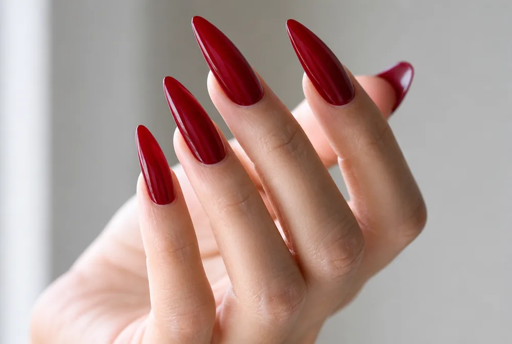 red stiletto nails with glossy cherry finish
