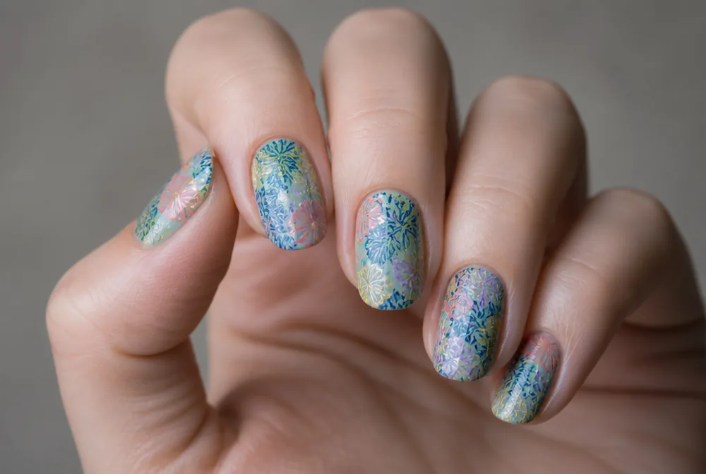 reverse stamped multicolored decal nails