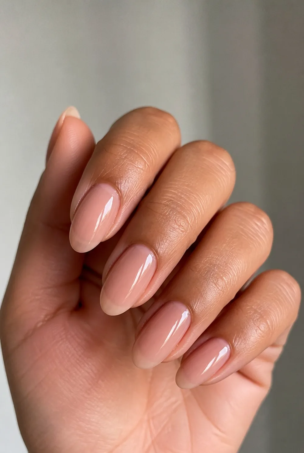round gel overlay nail art on olive skin, long length