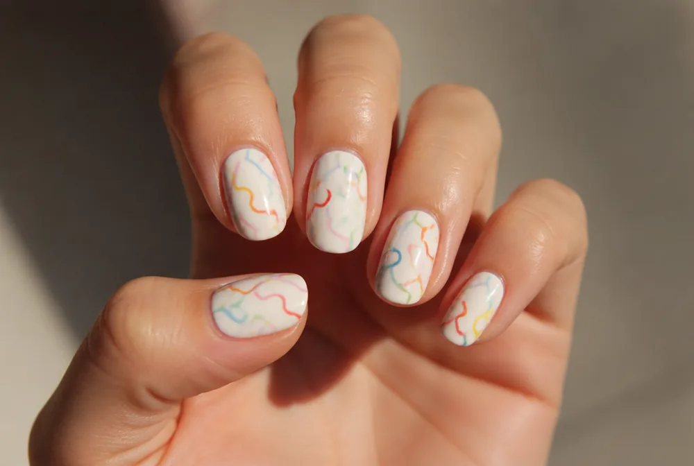 squiggle abstract nails in multiple colors