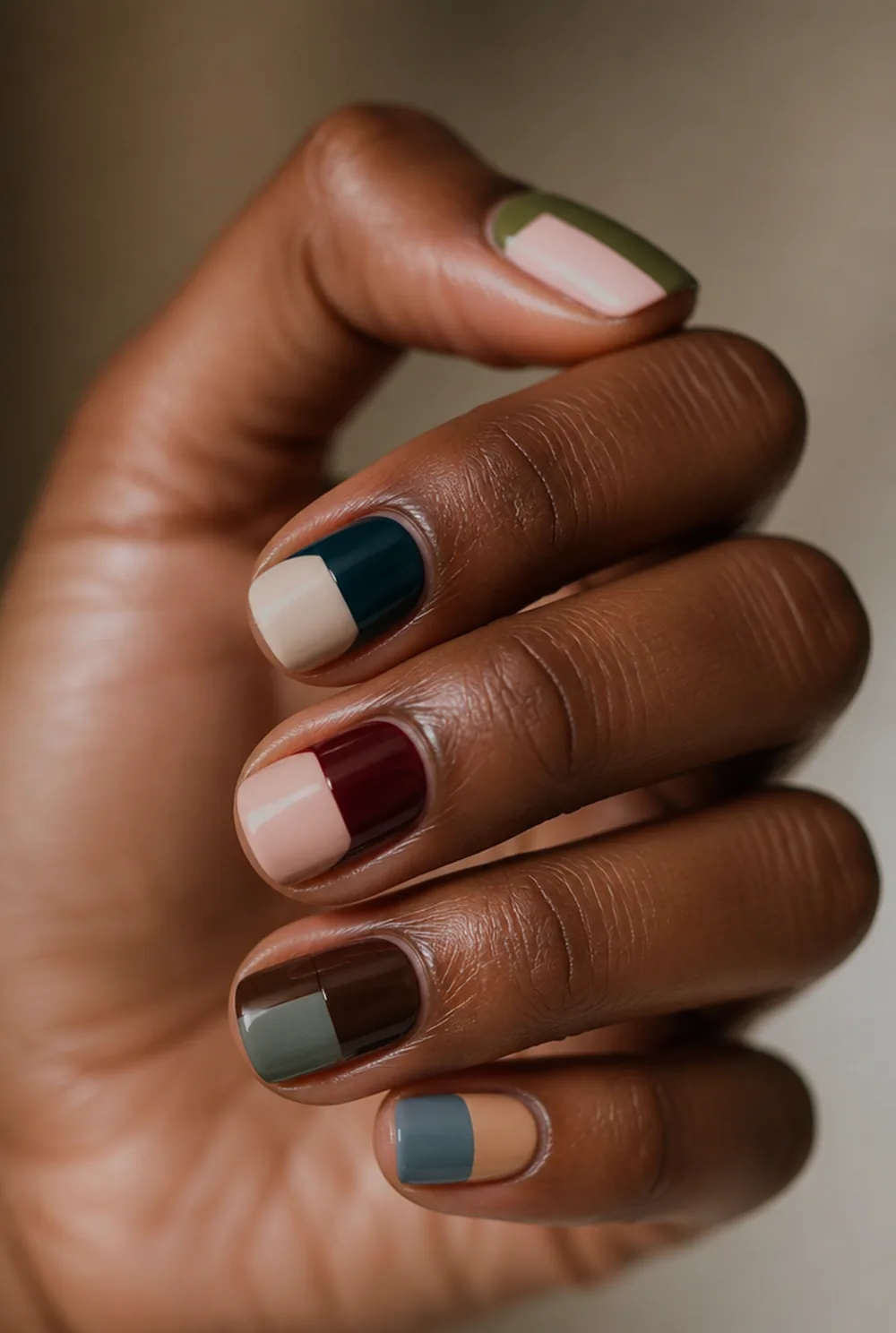 squoval colour block nail art on deep brown skin
