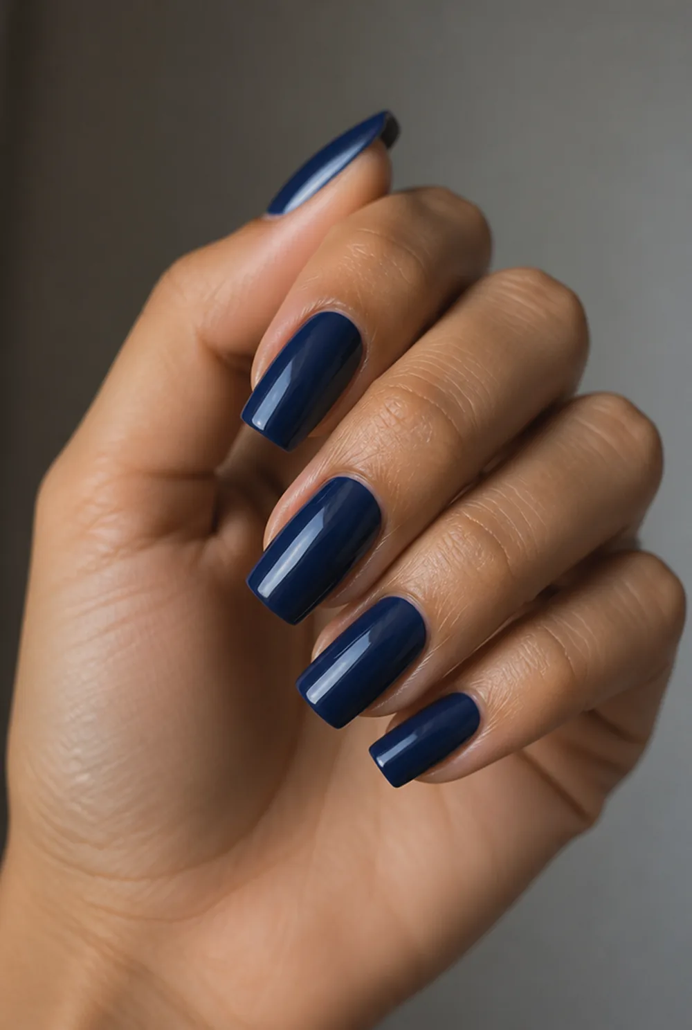 squoval navy nail art on olive skin, long length